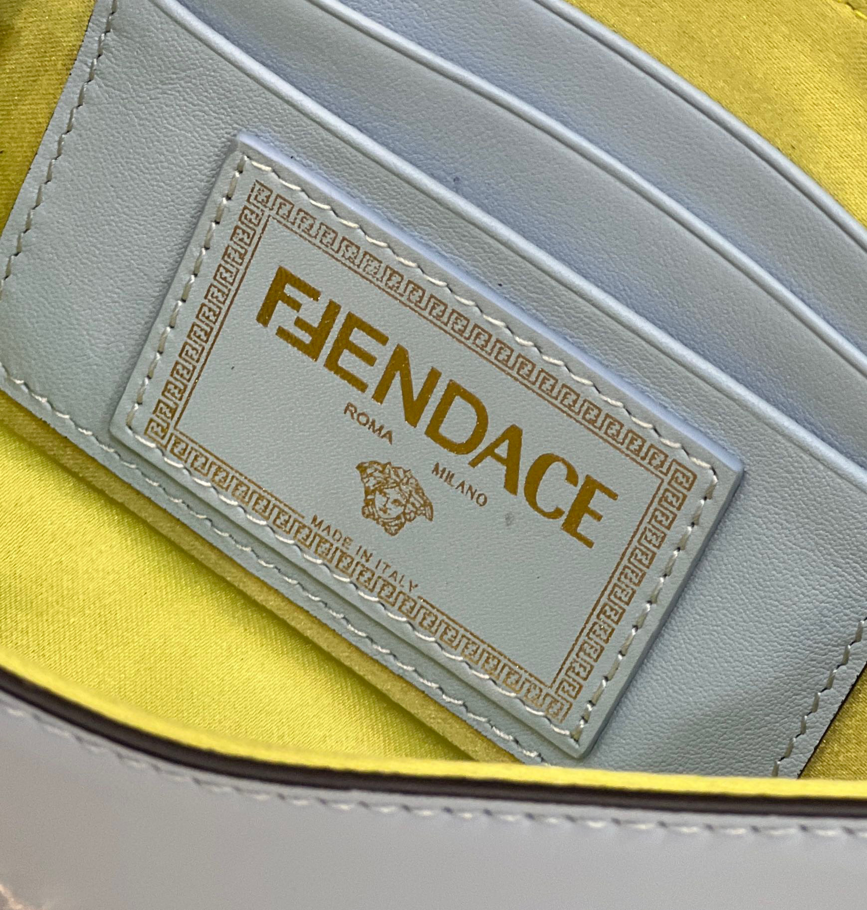 F**di & versace baguette