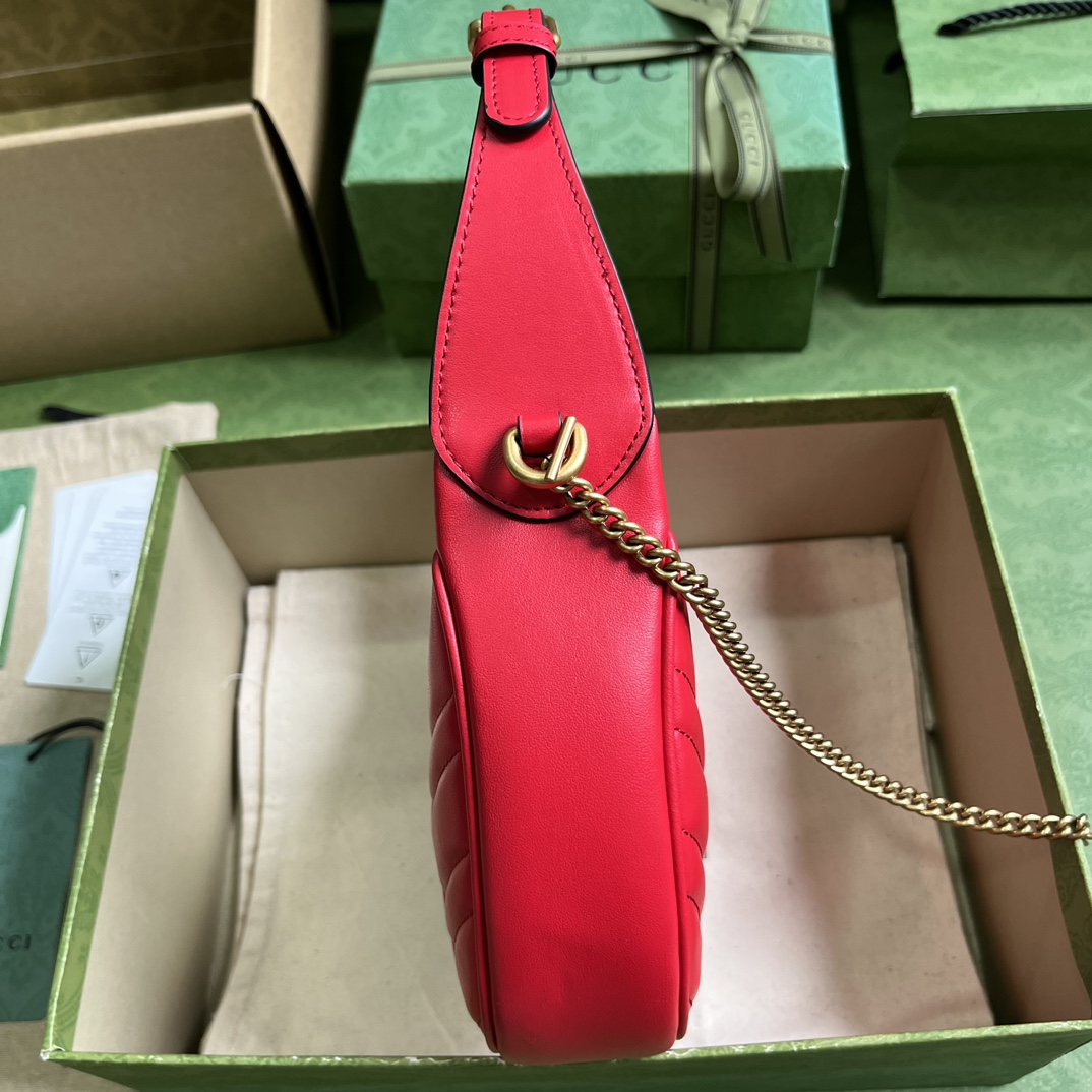 G*u*i marmont half-moon-shaped mini bag