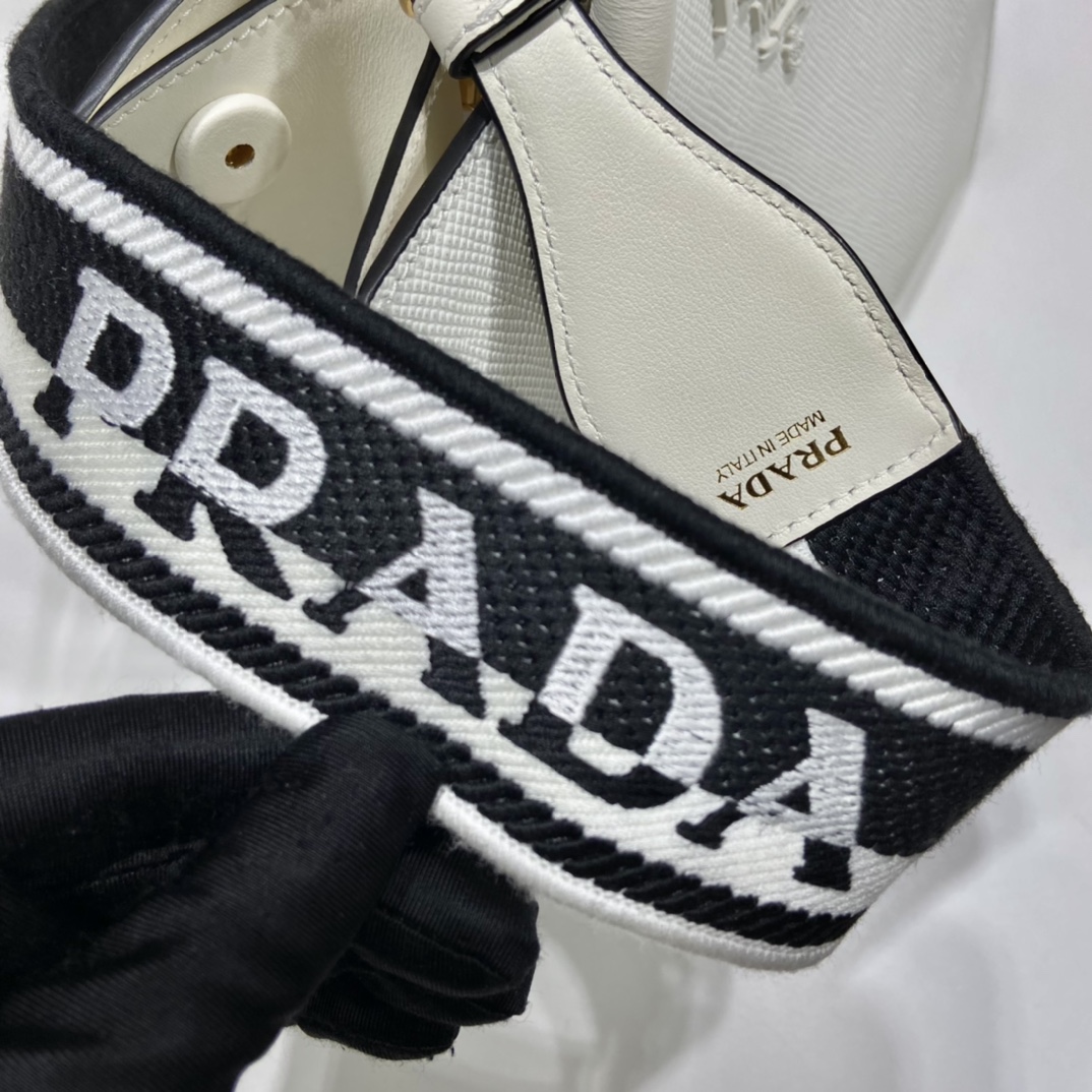 pra*a monoCh*0me small saffiano bag