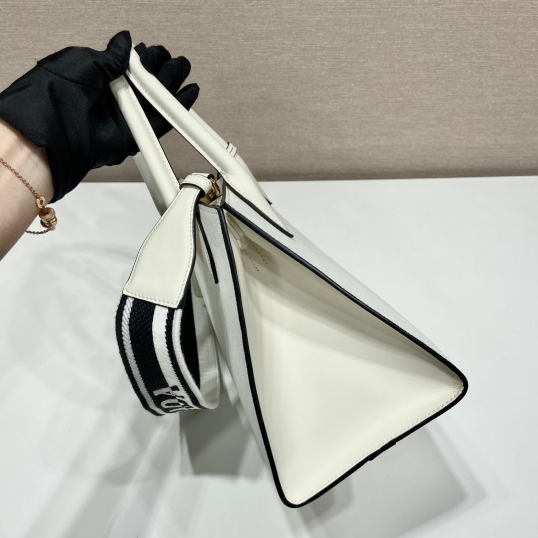 pra*a monoCh*0me small saffiano bag