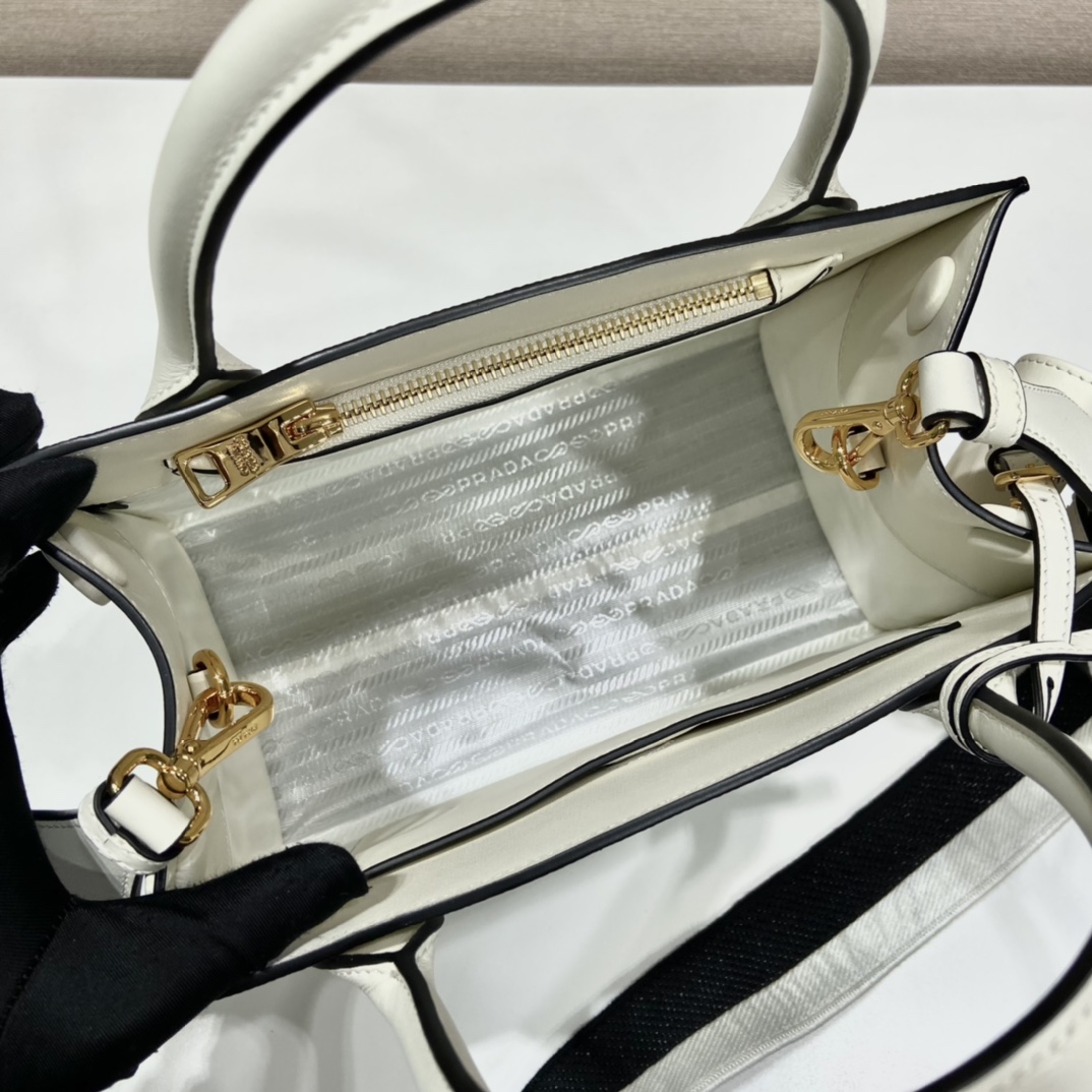 pra*a monoCh*0me small saffiano bag
