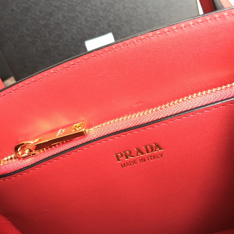 pra*a monoCh*0me small saffiano bag