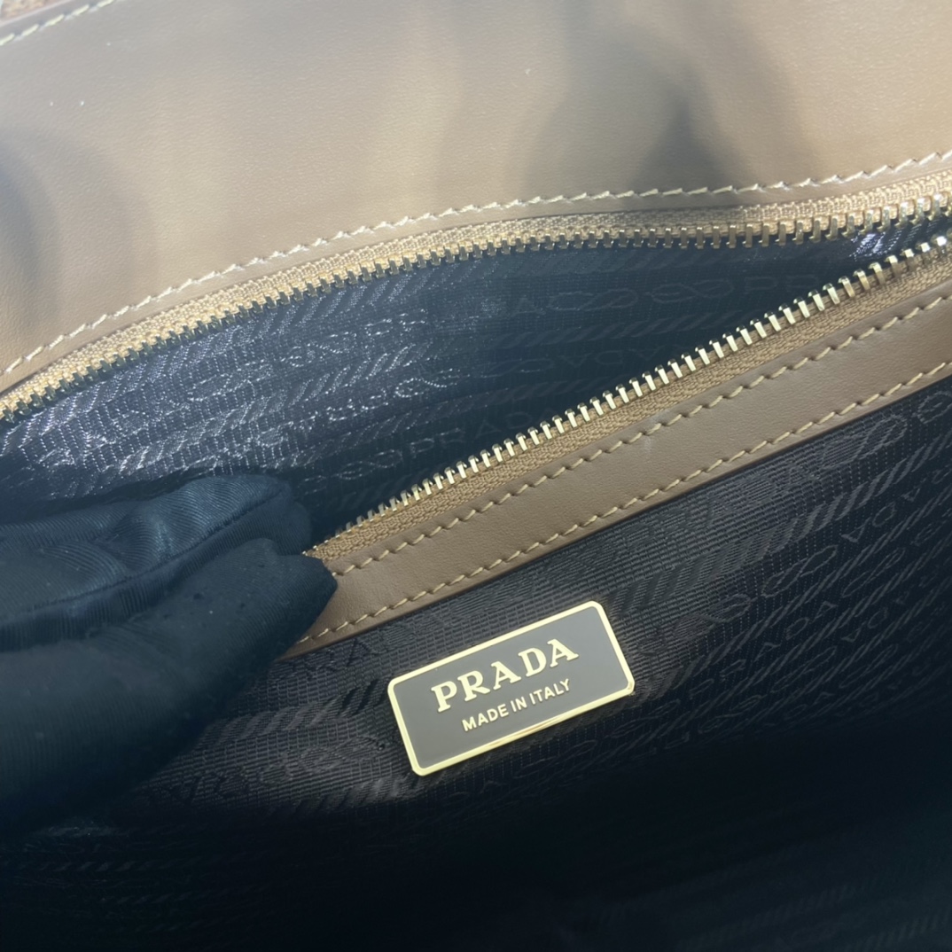 large Pra*a symbole embroidered fabric handbag