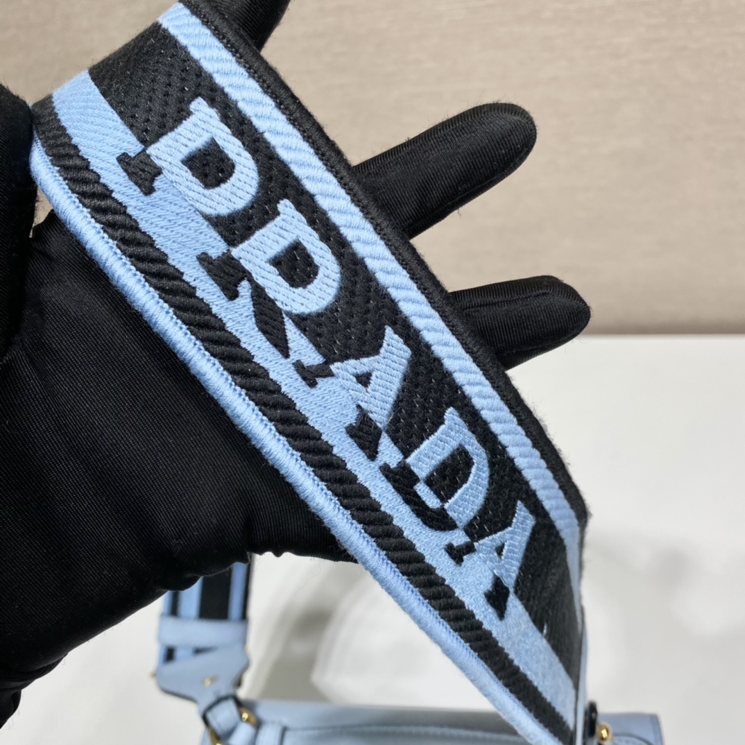 pra*a monoCh*0me saffiano and leather bag