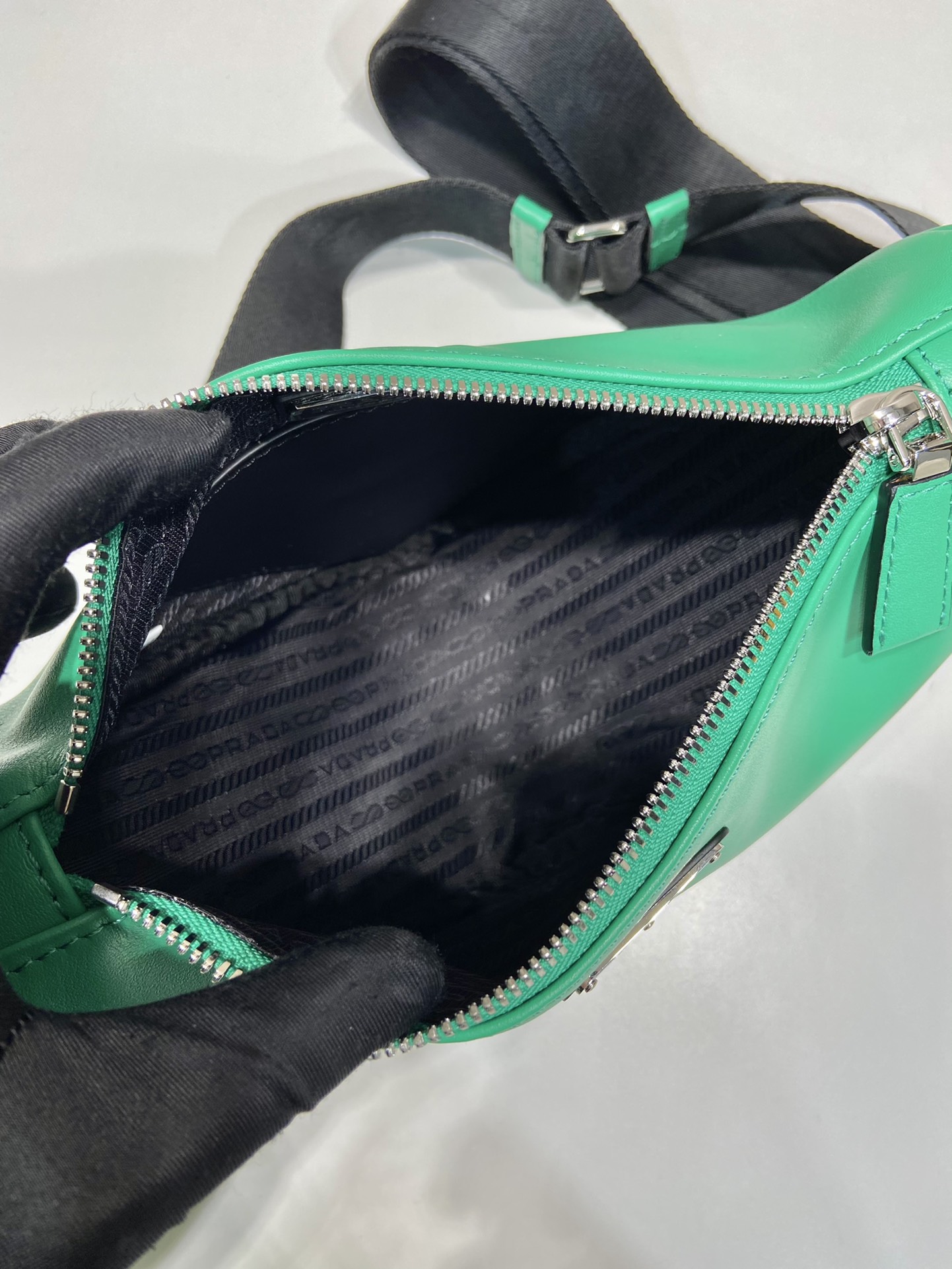 saffiano Pra*a triangle bag