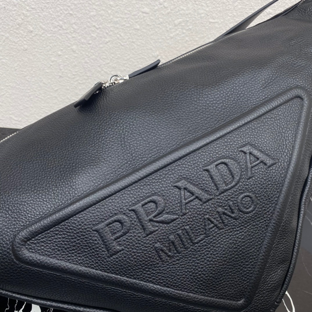 large leather Pra*a triangle bag