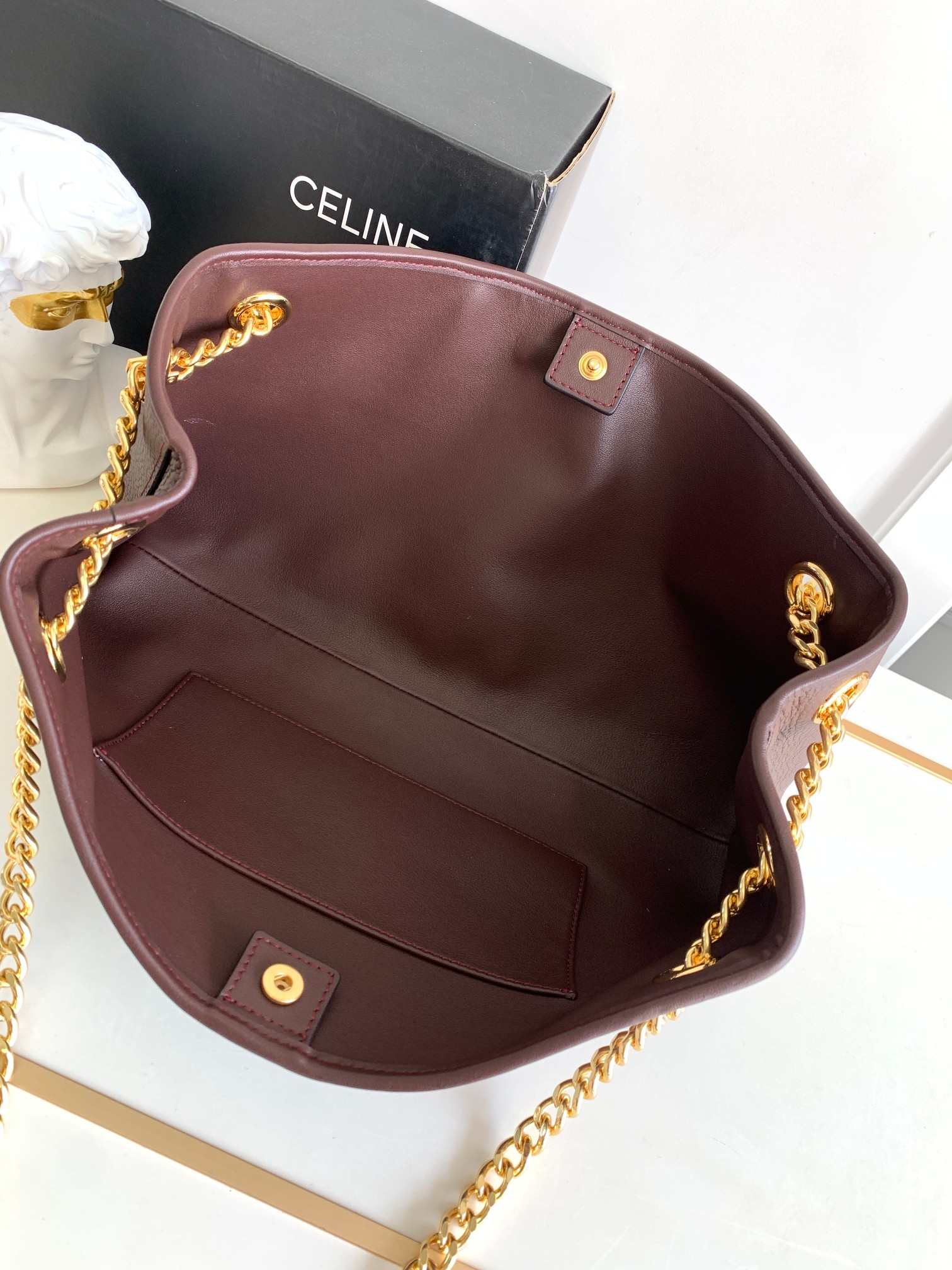ce**e medium newspaper bag in S*pple calfskin chestnut