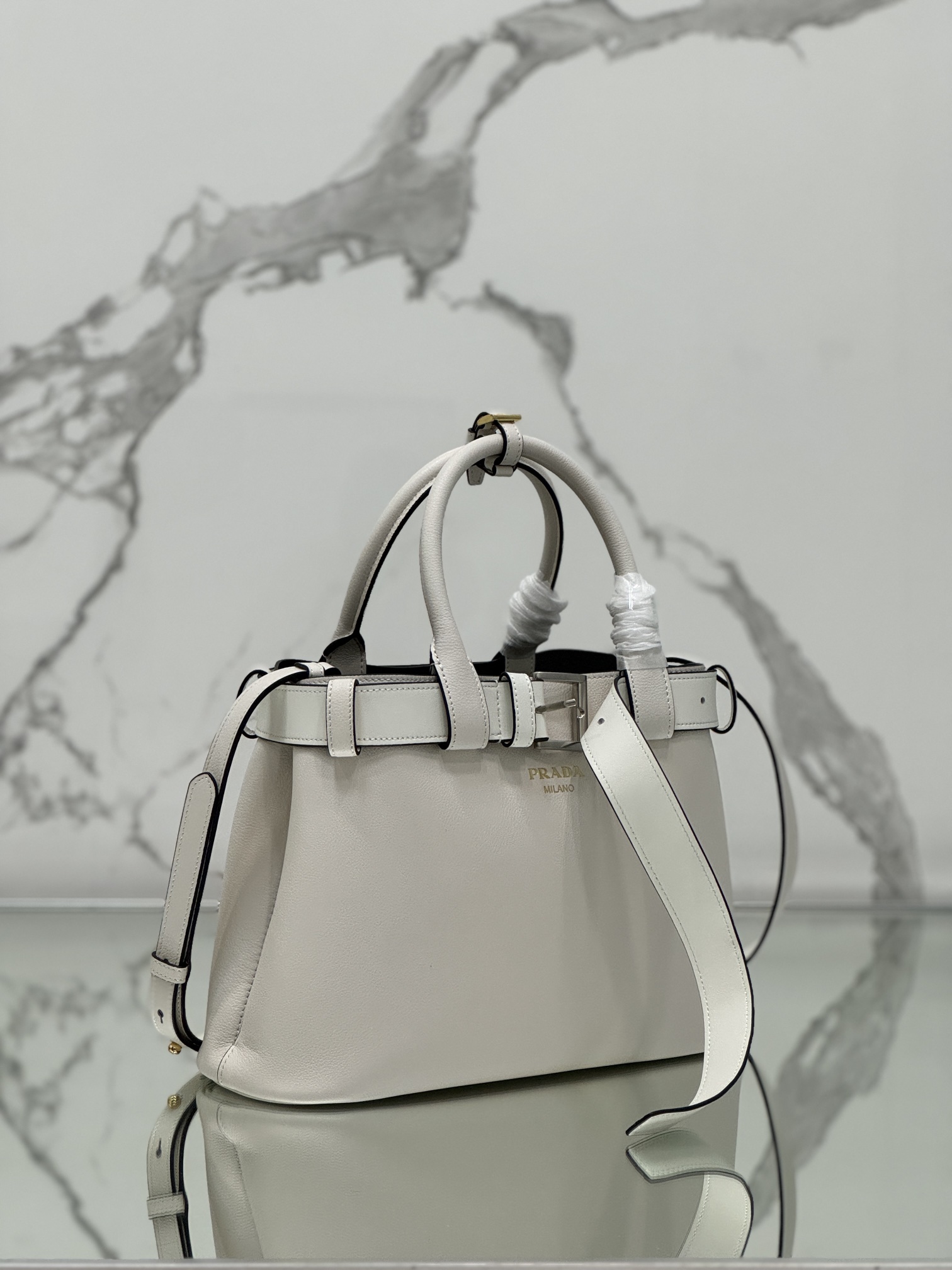 Pra*a buckle medium leather handbag with belt