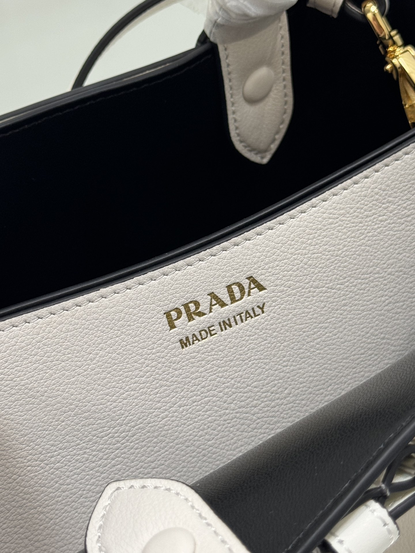 Pra*a buckle medium leather handbag with belt