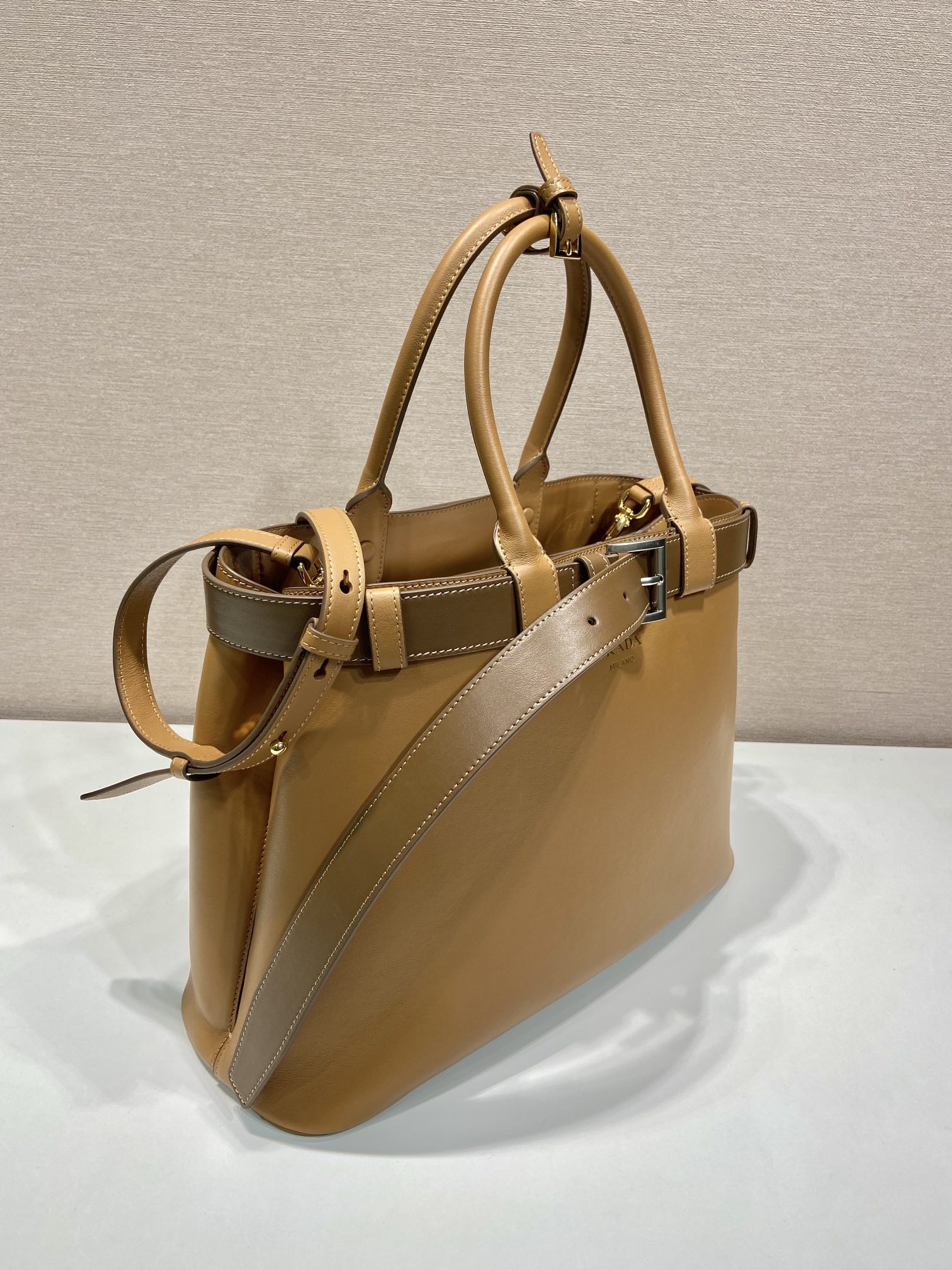 Pra*a buckle large leather handbag with belt