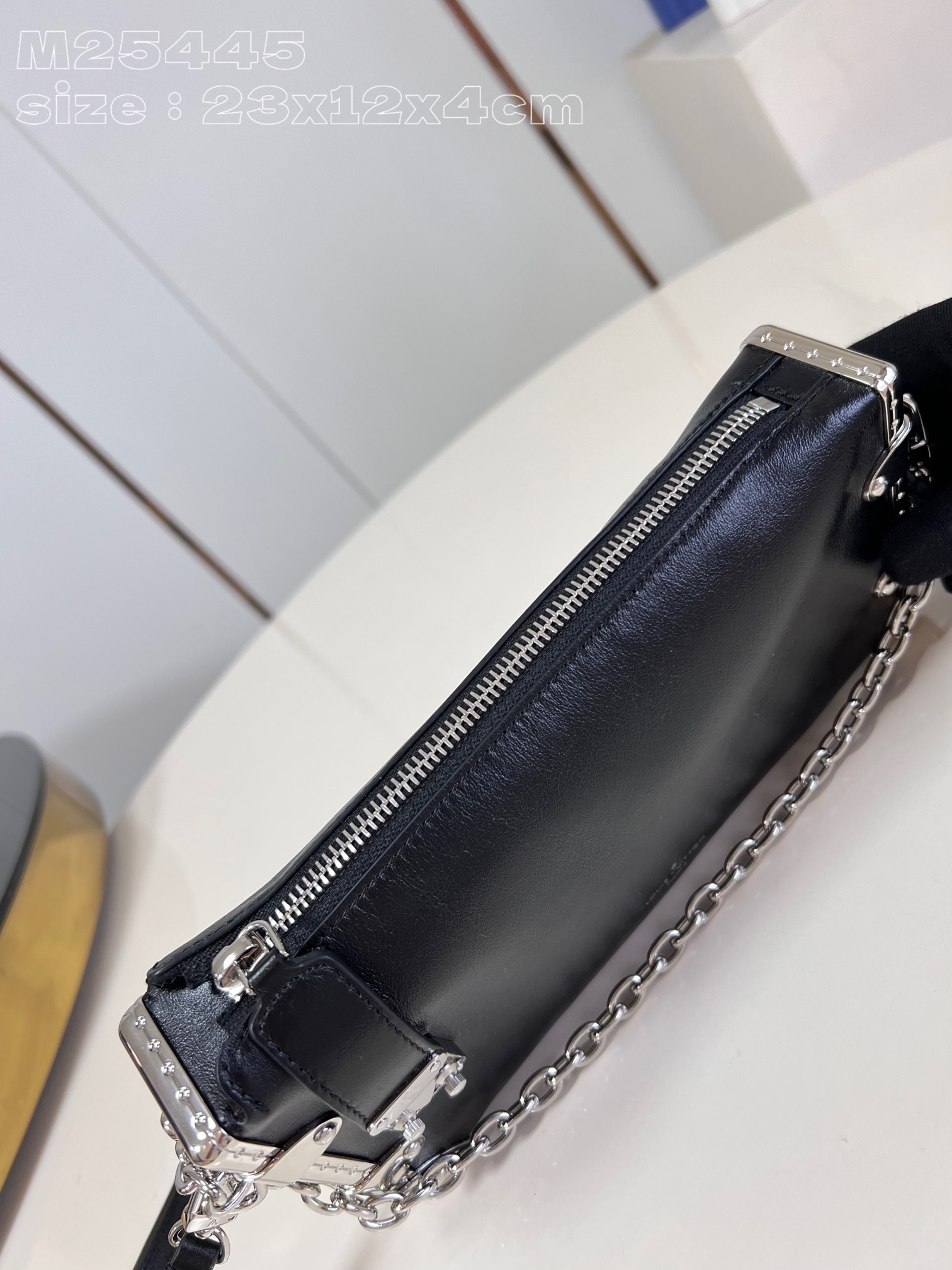 l**is V*t*n slim trunk handbag